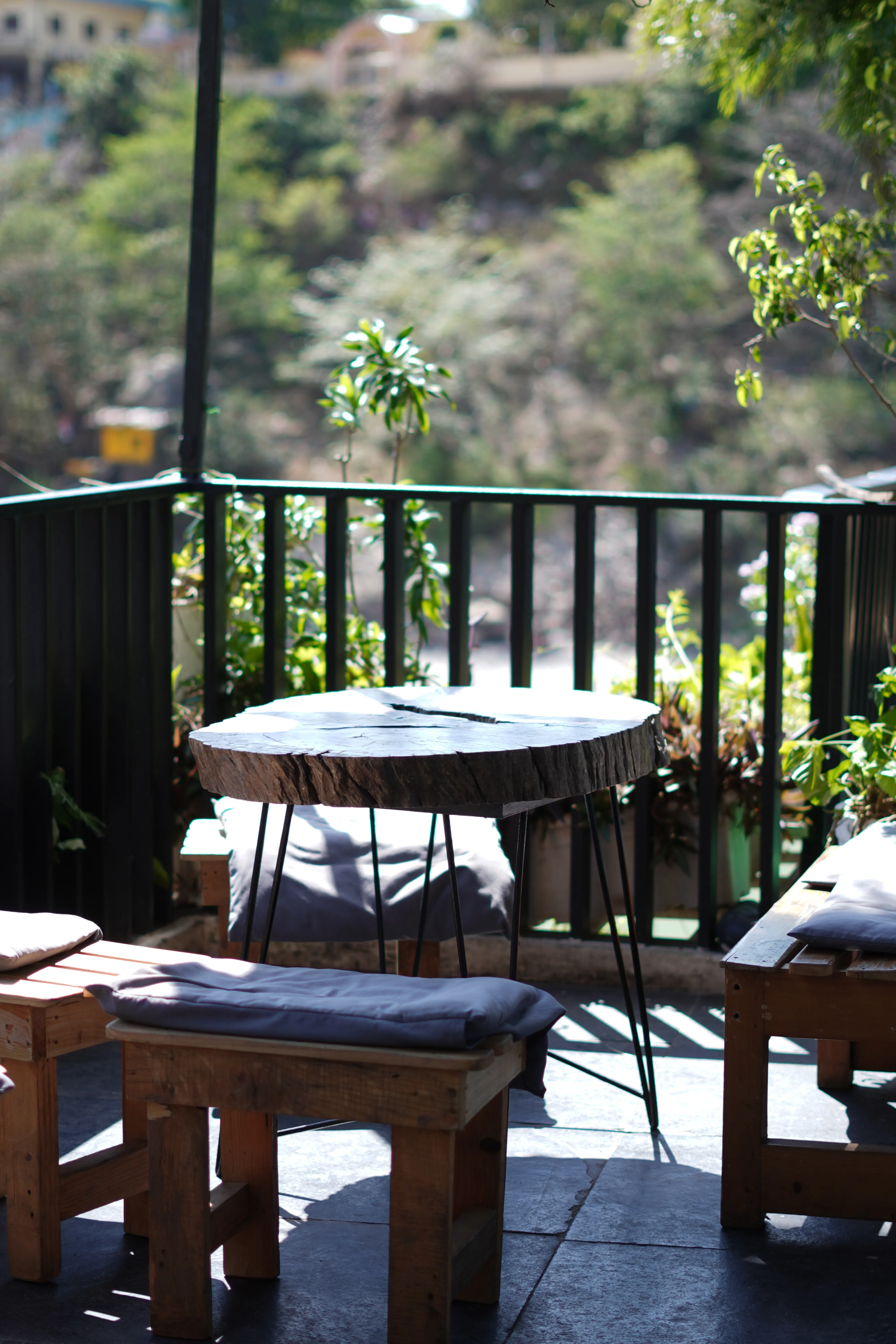 riverside sitting space Rishikesh warm lighting